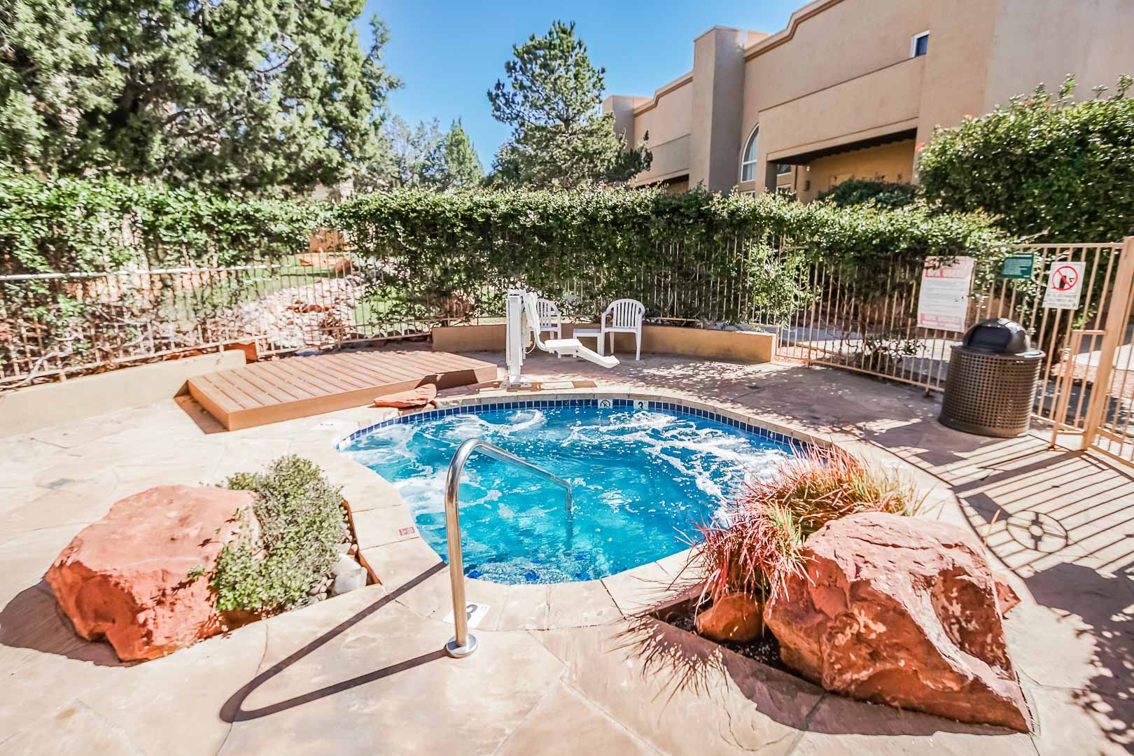 A beautiful outdoor swimming pool at VRI's Sedona Springs Resort in Sedona, Arizona.